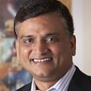 Ramesh_Ramani seen posing for a photo witha smile on his face